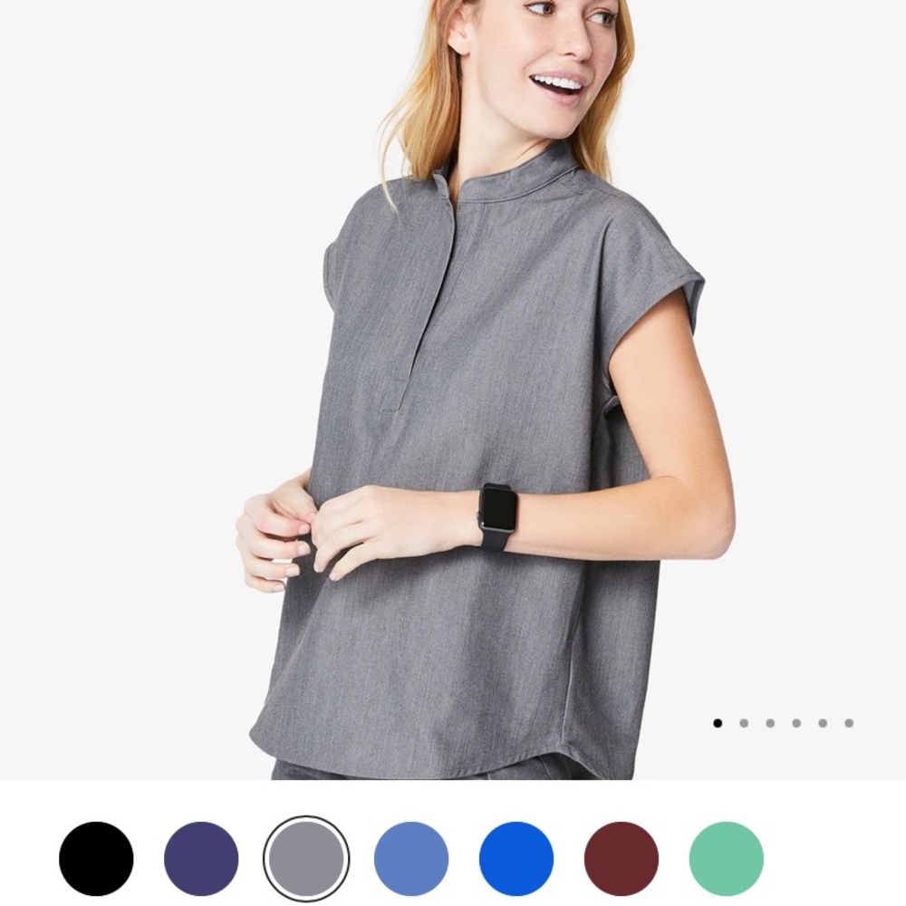 Figs Graphite grey color. Top is Medium and Pants are large.